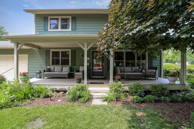 611 S 10th Ave, Saint Charles, IL 60174 - view of front of property with an outdoor living space, a porch, and an attached garage