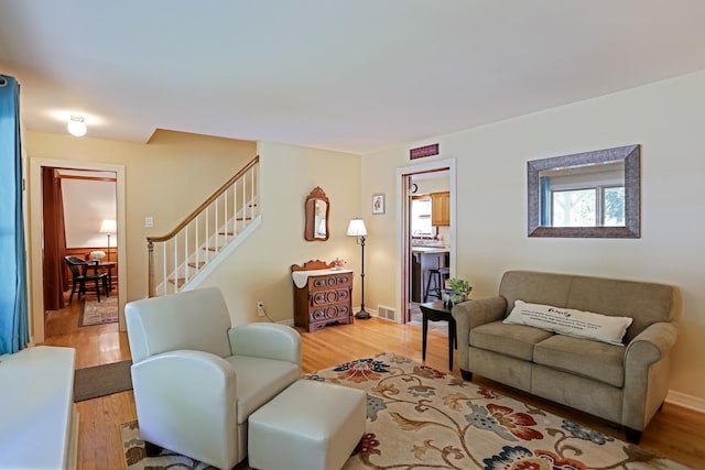 611 S 10th Ave, Saint Charles, IL 60174 - living area featuring stairway and light wood finished floors
