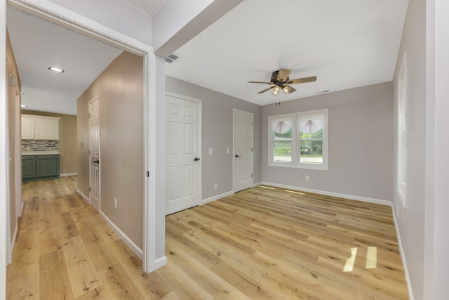 3708 W 162nd Pl, Markham, IL 60428 - unfurnished bedroom with light wood-style flooring, multiple closets, ceiling fan, and recessed lighting