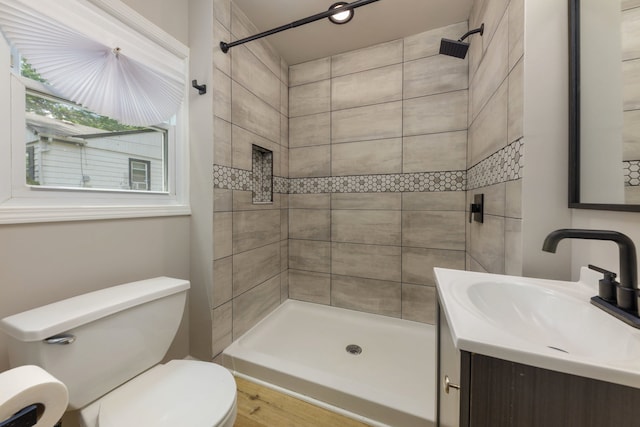 3708 W 162nd Pl, Markham, IL 60428 - bathroom with vanity, a tile shower, and wood finished floors