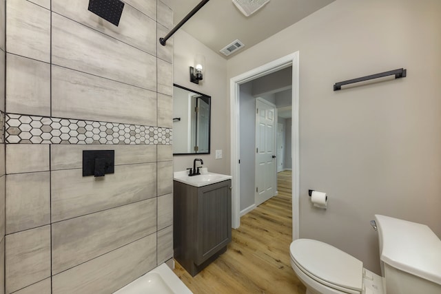 3708 W 162nd Pl, Markham, IL 60428 - bathroom featuring wood finished floors, vanity, and a shower