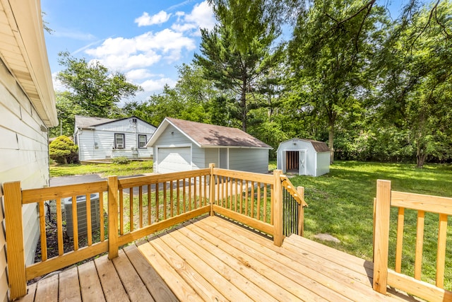 3708 W 162nd Pl, Markham, IL 60428 - wooden terrace featuring an outdoor structure, a detached garage, a lawn, and view of scattered trees