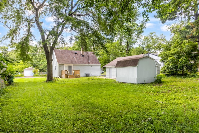 3708 W 162nd Pl, Markham, IL 60428 - view of grassy yard with a storage shed and a wooden deck