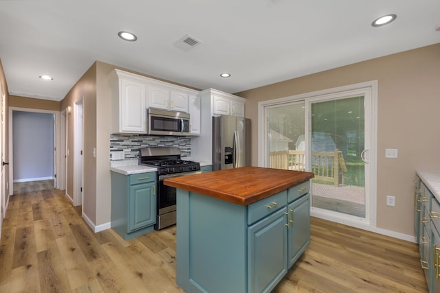 3708 W 162nd Pl, Markham, IL 60428 - kitchen with appliances with stainless steel finishes, wooden counters, white cabinetry, tasteful backsplash, and light wood-type flooring