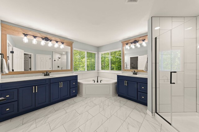 1284 Mcdole Dr, Sugar Grove, IL 60554 - bathroom featuring a shower stall, two vanities, a bath, and marble look tile flooring