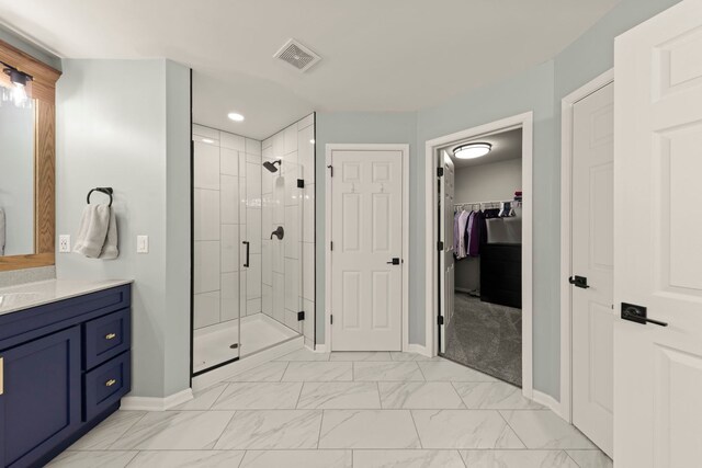 1284 Mcdole Dr, Sugar Grove, IL 60554 - bathroom with baseboards, a shower stall, vanity, a spacious closet, and marble look tiles