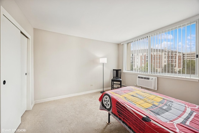 20 N Tower Rd Unit 3G, Oak Brook, IL 60523 - bedroom with carpet floors, baseboards, a closet, and a wall unit AC