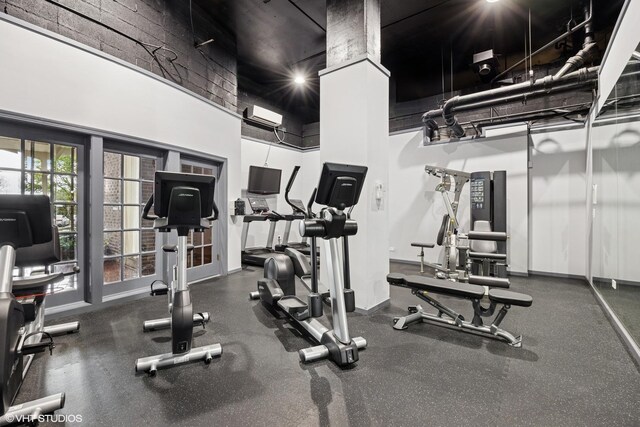 20 N Tower Rd Unit 3G, Oak Brook, IL 60523 - workout area with an AC wall unit and a high ceiling