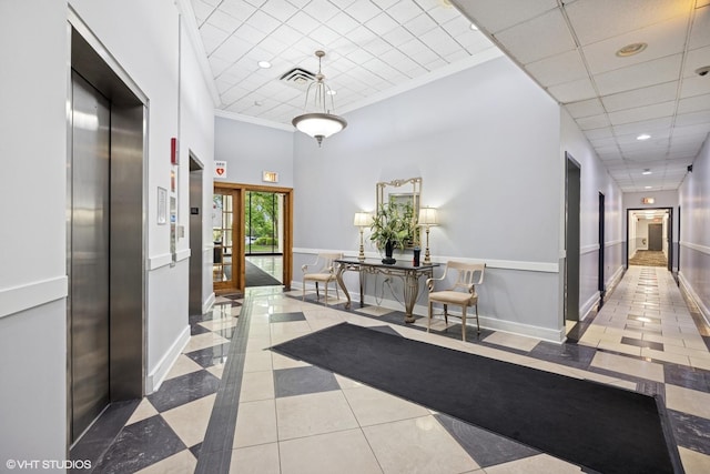 20 N Tower Rd Unit 3G, Oak Brook, IL 60523 - corridor featuring elevator, tile patterned floors, baseboards, inlaid floor details, and recessed lighting