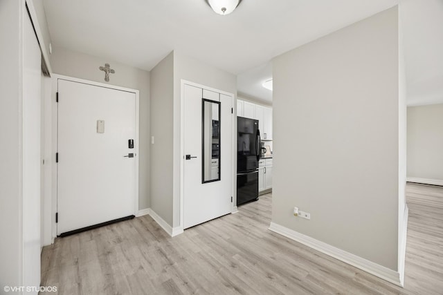 20 N Tower Rd Unit 3G, Oak Brook, IL 60523 - foyer with light wood finished floors and baseboards