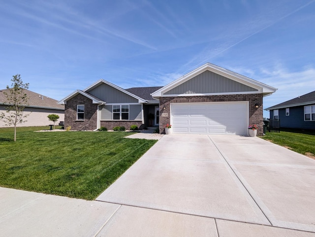 1785 Condor Dr, Manteno, IL 60950 - ranch-style house featuring brick siding, an attached garage, a front yard, and concrete driveway