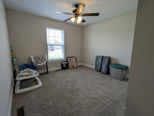 1785 Condor Dr, Manteno, IL 60950 - misc room with a ceiling fan, carpet flooring, and baseboards