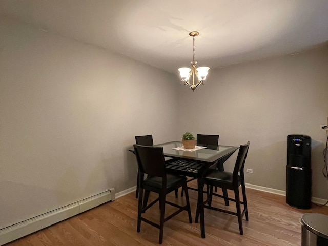 1188 Royal Glen Dr Unit 211, Glen Ellyn, IL 60137 - dining room with a baseboard heating unit, a chandelier, wood finished floors, and baseboards