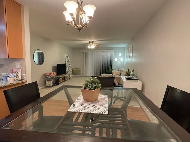1188 Royal Glen Dr Unit 211, Glen Ellyn, IL 60137 - dining space featuring a chandelier, ceiling fan, wood finished floors, and baseboards