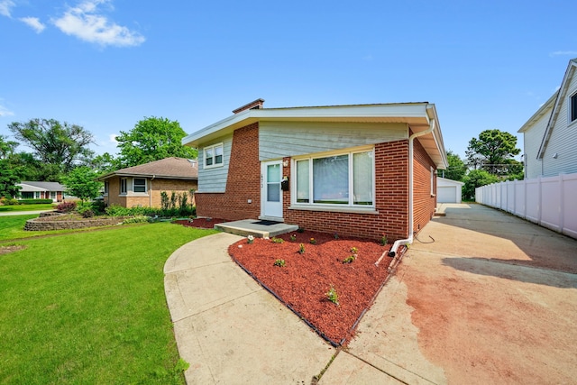 473 W Verret St, Elmhurst, IL 60126 - view of front of home featuring brick siding and a garage