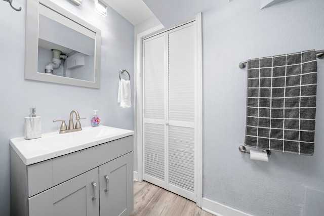 473 W Verret St, Elmhurst, IL 60126 - bathroom featuring vanity and wood finished floors