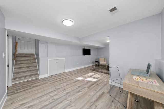 473 W Verret St, Elmhurst, IL 60126 - finished below grade area with baseboards, wood finished floors, and stairs