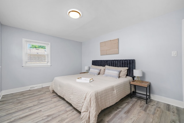 473 W Verret St, Elmhurst, IL 60126 - bedroom featuring wood finished floors and baseboards