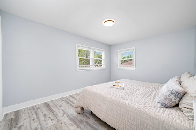 473 W Verret St, Elmhurst, IL 60126 - bedroom featuring wood finished floors and baseboards