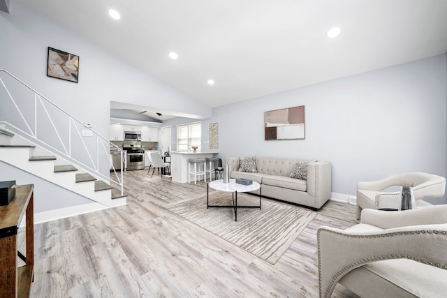 473 W Verret St, Elmhurst, IL 60126 - living area with light wood-style floors, stairs, recessed lighting, baseboards, and vaulted ceiling