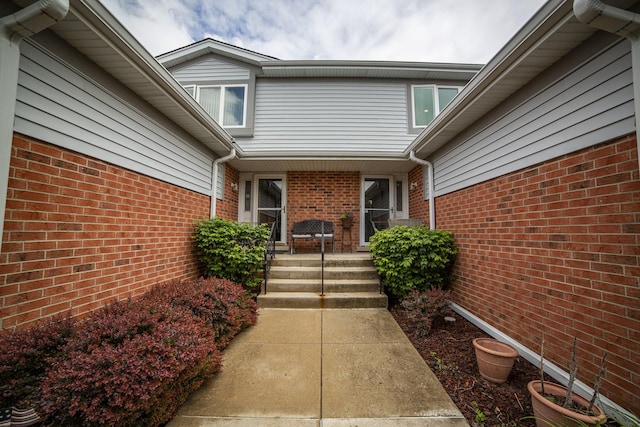 7902 160th St, Tinley Park, IL 60477 - view of exterior entry featuring brick siding