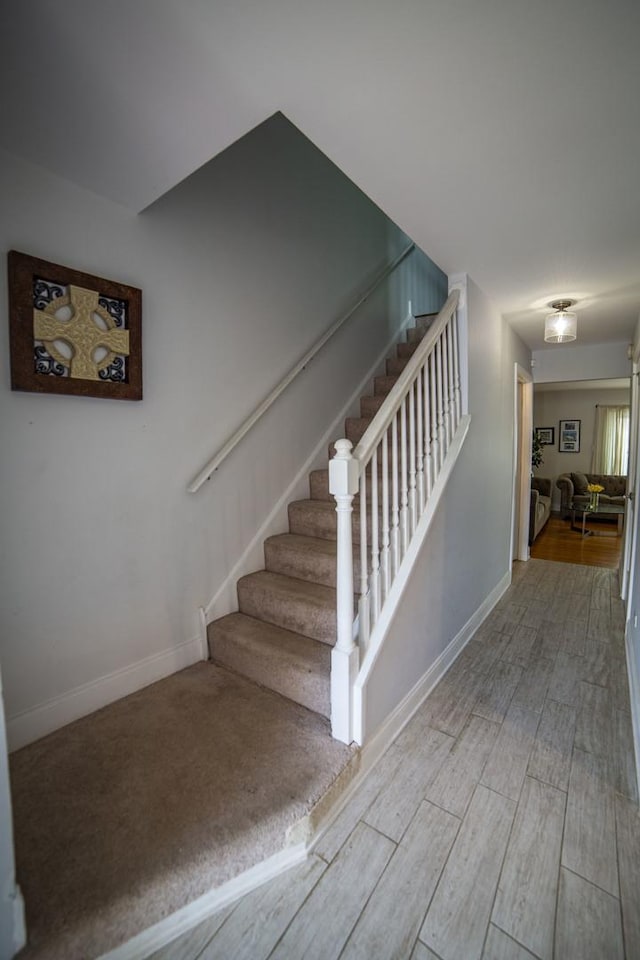 7902 160th St, Tinley Park, IL 60477 - staircase featuring wood finished floors and baseboards