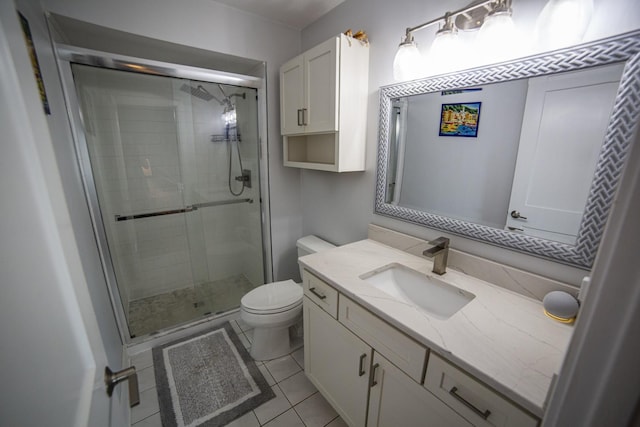 7902 160th St, Tinley Park, IL 60477 - bathroom featuring vanity, toilet, a shower stall, and tile patterned flooring