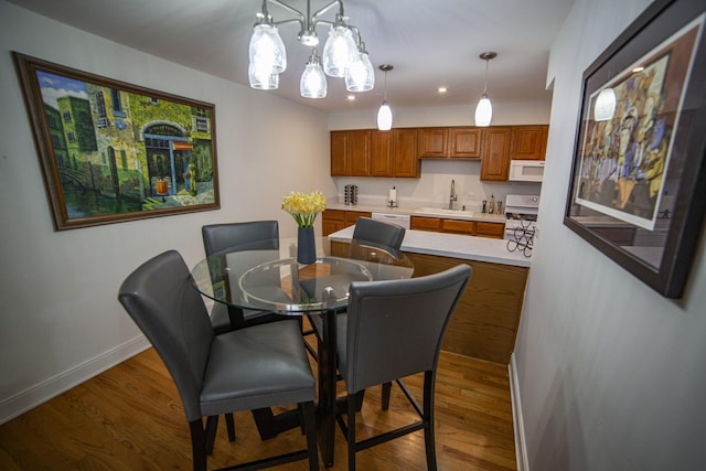 7902 160th St, Tinley Park, IL 60477 - dining space with baseboards, wood finished floors, a chandelier, and recessed lighting