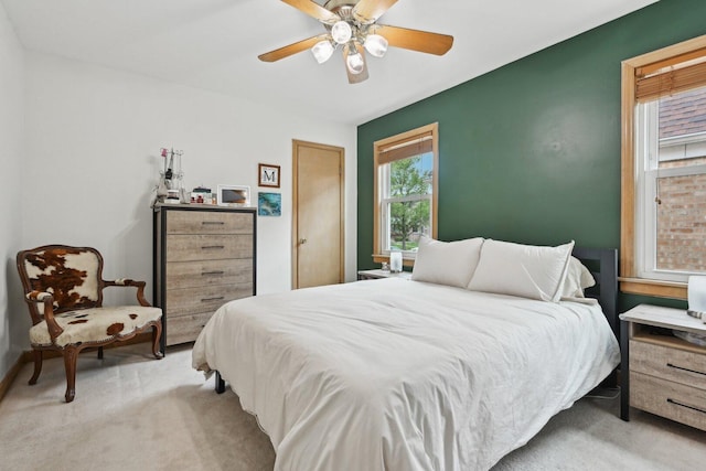 7517 N Oketo Ave, Chicago, IL 60631 - bedroom featuring light carpet and ceiling fan