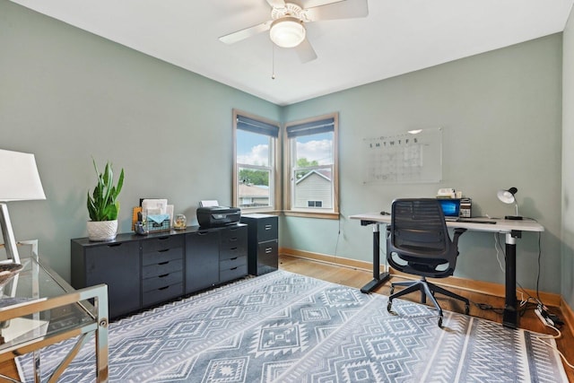 7517 N Oketo Ave, Chicago, IL 60631 - office area featuring wood finished floors, a ceiling fan, and baseboards