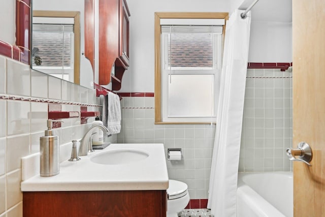 7517 N Oketo Ave, Chicago, IL 60631 - full bathroom featuring tile walls, toilet, vanity, and shower / tub combo