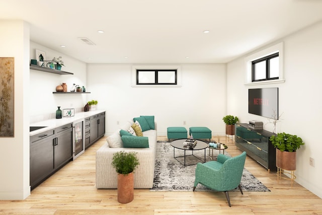 2636 W Evergreen Ave Unit 1, Chicago, IL 60622 - living area featuring beverage cooler, a bar, light wood-type flooring, and recessed lighting