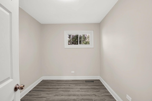 232 Camden Dr, Steger, IL 60475 - spare room featuring dark wood-style flooring and baseboards