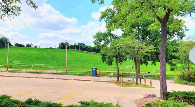 5600 Hillcrest Ln Unit 2L, Lisle, IL 60532 - view of community featuring uncovered parking