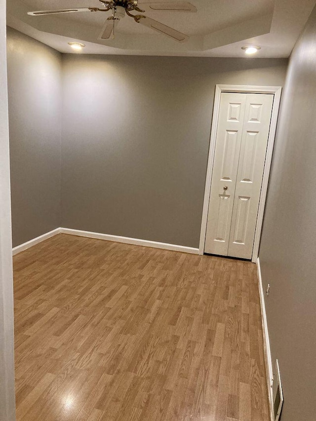 5352 N Magnet Ave, Chicago, IL 60630 - empty room featuring a ceiling fan, light wood-type flooring, baseboards, and recessed lighting