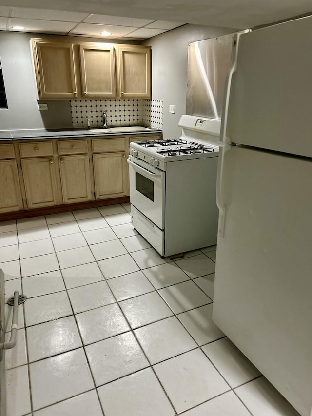 5352 N Magnet Ave, Chicago, IL 60630 - kitchen with white appliances, light tile patterned floors, backsplash, and a paneled ceiling