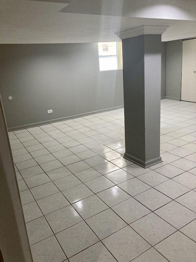 5352 N Magnet Ave, Chicago, IL 60630 - below grade area with light tile patterned flooring and baseboards