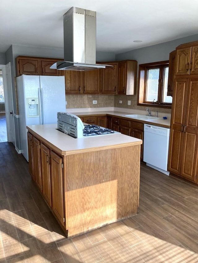 5352 N Magnet Ave, Chicago, IL 60630 - kitchen with island exhaust hood, white appliances, a sink, and wood finished floors