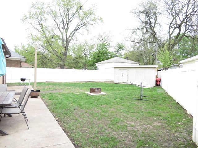 2020 Greengold St, Crest Hill, IL 60403 - view of yard featuring a fire pit, an outdoor structure, and a patio