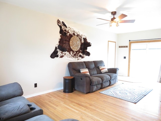 2020 Greengold St, Crest Hill, IL 60403 - living area featuring wood finished floors, a ceiling fan, and baseboards