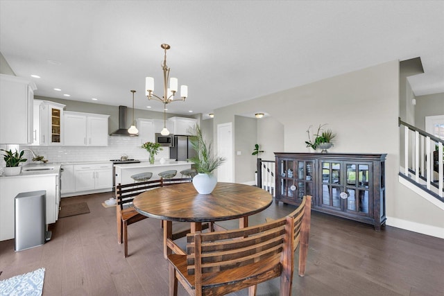 1908 Littlefield Ln, Mahomet, IL 61853 - dining area with dark wood-style floors, a chandelier, recessed lighting, stairway, and baseboards