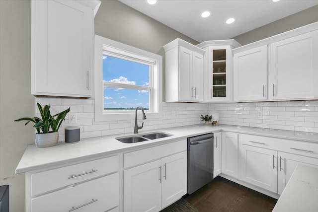 1908 Littlefield Ln, Mahomet, IL 61853 - kitchen with a sink, dishwasher, white cabinets, light countertops, and glass insert cabinets