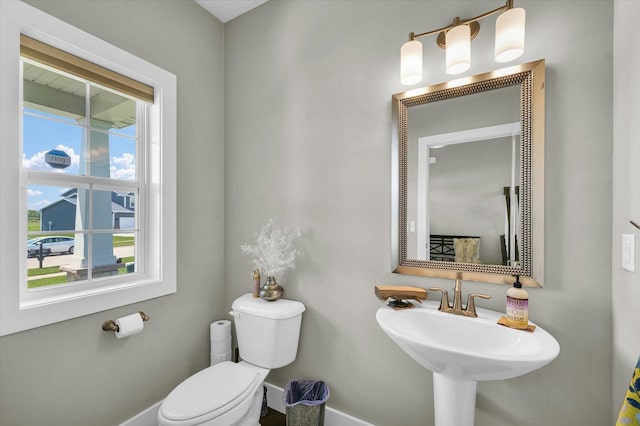 1908 Littlefield Ln, Mahomet, IL 61853 - half bathroom with toilet and baseboards