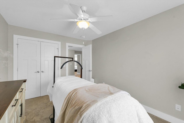 1908 Littlefield Ln, Mahomet, IL 61853 - bedroom with light colored carpet, a closet, baseboards, and ceiling fan
