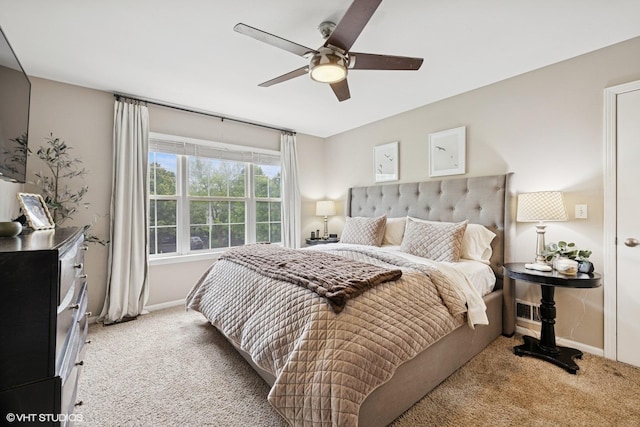 2834 Forestview Dr, Carpentersville, IL 60110 - bedroom featuring light carpet, baseboards, and ceiling fan