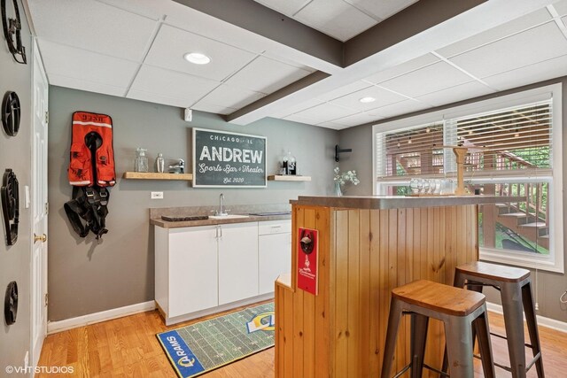 2834 Forestview Dr, Carpentersville, IL 60110 - indoor wet bar featuring light wood-type flooring, baseboards, recessed lighting, and a drop ceiling