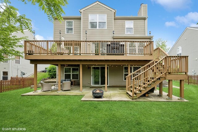 2834 Forestview Dr, Carpentersville, IL 60110 - back of house featuring a patio, a wooden deck, and an outdoor living space with a fire pit