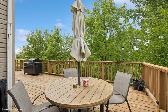 2834 Forestview Dr, Carpentersville, IL 60110 - wooden deck featuring grilling area and outdoor dining space