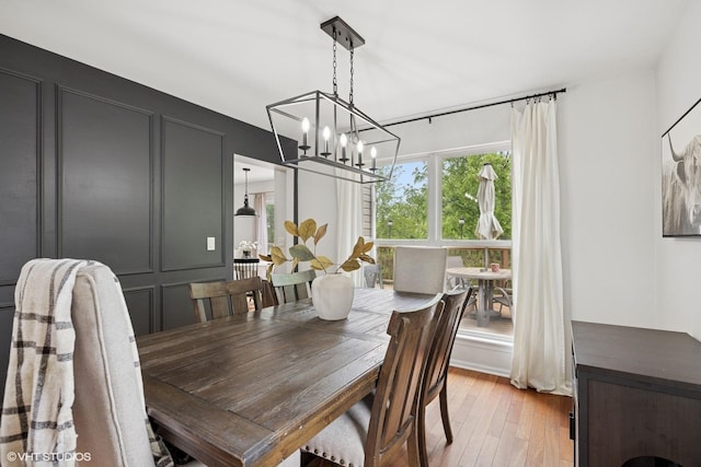 2834 Forestview Dr, Carpentersville, IL 60110 - dining space featuring a chandelier and light wood-style floors
