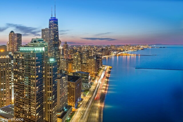 505 N Lake Shore Dr Unit 5201, Chicago, IL 60611 - aerial view at dusk of a water view and a view of city